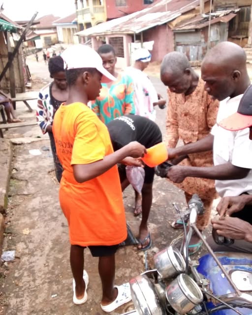 Community members receiving seeds